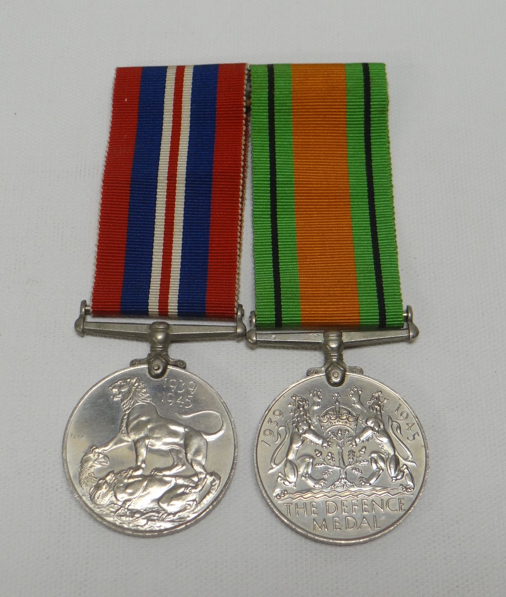 A 1939-45 DEFENCE MEDAL & A 1939-45 CAMPAIGN MEDAL, both with ribbons, uninscribed but awarded to