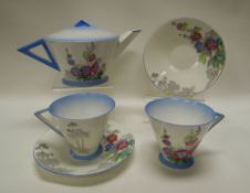 A THREE-PIECE SHELLEY BACHELOR TEASET floral decorated in the Art Deco shape No.756533