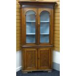 A NINETEENTH CENTURY TWO-STAGE WELSH FARMHOUSE CORNER CABINET-CUPBOARD having a two-door arch glazed