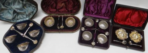 FOUR CASED SILVER SALT SETS with spoons, 8.3ozs total