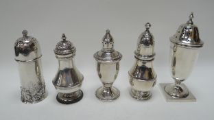 A COLLECTION OF FIVE PEPPERETTES all of 'medium' size including a London 1818 example, 10ozs (