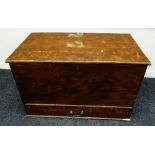 A NINETEENTH CENTURY STAINED PINE SEAMAN'S CHEST of primitive form with hinged lid and base