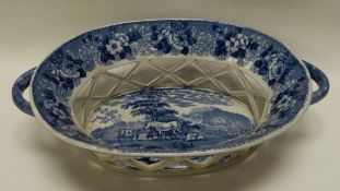 AN ADAMS IRONSTONE 'CATTLE SCENERY' BASKET of oval shape, having twin handles and with diamond shape