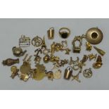 A LARGE QUANTITY OF MAINLY (IF NOT ALL) 9CT YELLOW GOLD CHARMS, 82gms gross (approx)