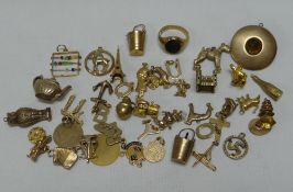 A LARGE QUANTITY OF MAINLY (IF NOT ALL) 9CT YELLOW GOLD CHARMS, 82gms gross (approx)