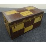 A VINTAGE CABIN TRUNK of checker design with initials, the interior with sectioned lift out