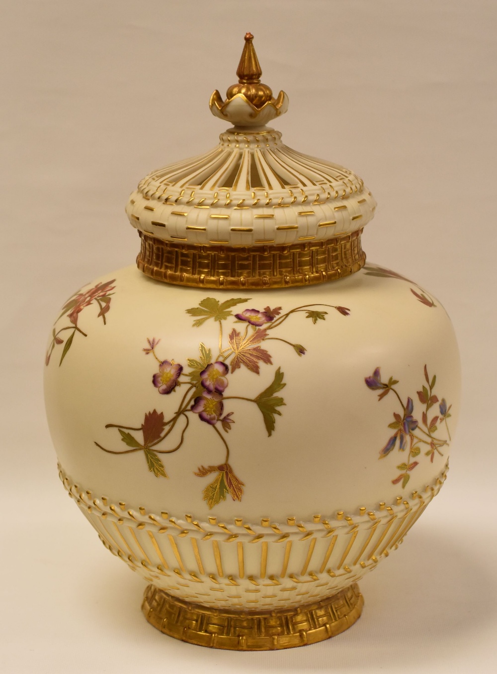 A ROYAL WORCESTER BLUSH IVORY POT-POURRI with gilded and painted branches of flowers to the body,