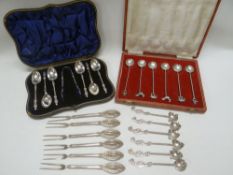 A CASED SILVER APOSTLE SPOON & TONG SET, A VICTORIAN RUPEE-SPOON SET and a parcel of continental