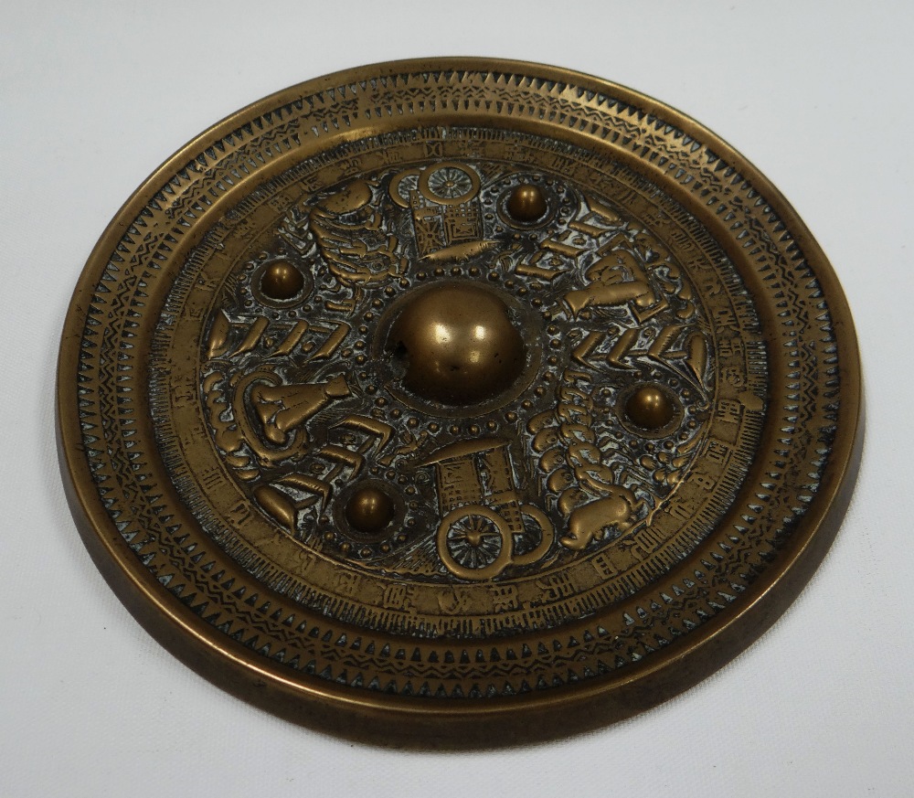 A CHINESE TANG STYLE BRONZE MIRROR of circular form decorated in relief with alternate rickshaws and - Image 2 of 2