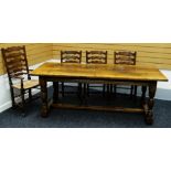 A REPRODUCTION OAK REFECTORY TABLE TOGETHER WITH 4+2 LADDERBACK RUSH SEATED CHAIRS the table on