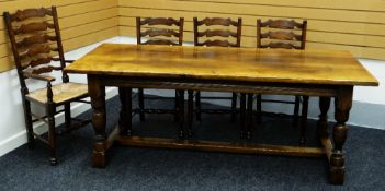 A REPRODUCTION OAK REFECTORY TABLE TOGETHER WITH 4+2 LADDERBACK RUSH SEATED CHAIRS the table on