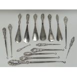 SIX SILVER-HANDLED SHOE HORNS & TEN SIMILAR BUTTON HOOKS