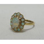 AN OPAL CLUSTER RING set in 9ct yellow gold, 3.53gms Provenance: receipt for purchase, £230 in