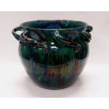 A WILLIAM FISHLEY HOLLAND STUDIO POTTERY mottled green glaze slipware planter with swirl loops to