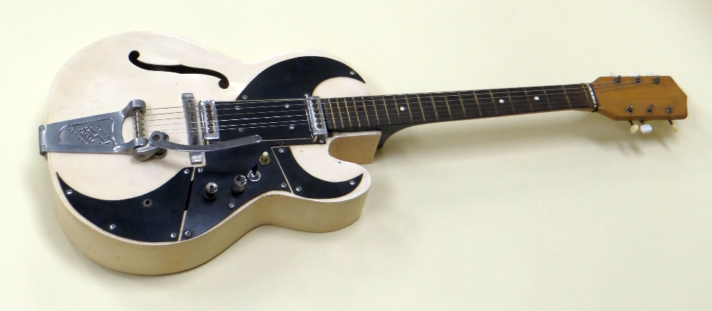 A HOFNER 'BIGSBY' SEMI-ACOUSTIC GUITAR, 1950s in ivory with chrome and black, bearing US Patent