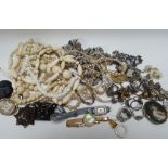 A TIN OF COSTUME JEWELLERY, IVORY / BONE BEADS, SILVER ITEMS etc