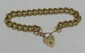 A 9CT CURB-LINK BRACELET & HEART-SHAPED PADLOCK, 44gms