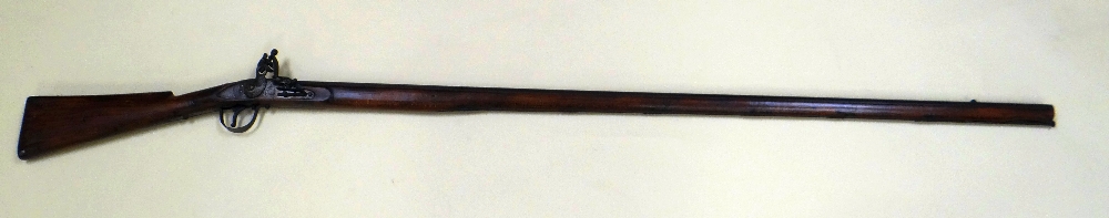AN ANTIQUE 'ELEPHANT-GUN' HUNTING RIFLE with elephant symbol engraved to the metal plate, 170cms