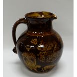 A WILLIAM FISHLEY HOLLAND STUDIO POTTERY treacle glazed harvest-jug with poem to the neck 'Fill me