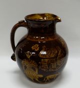 A WILLIAM FISHLEY HOLLAND STUDIO POTTERY treacle glazed harvest-jug with poem to the neck 'Fill me
