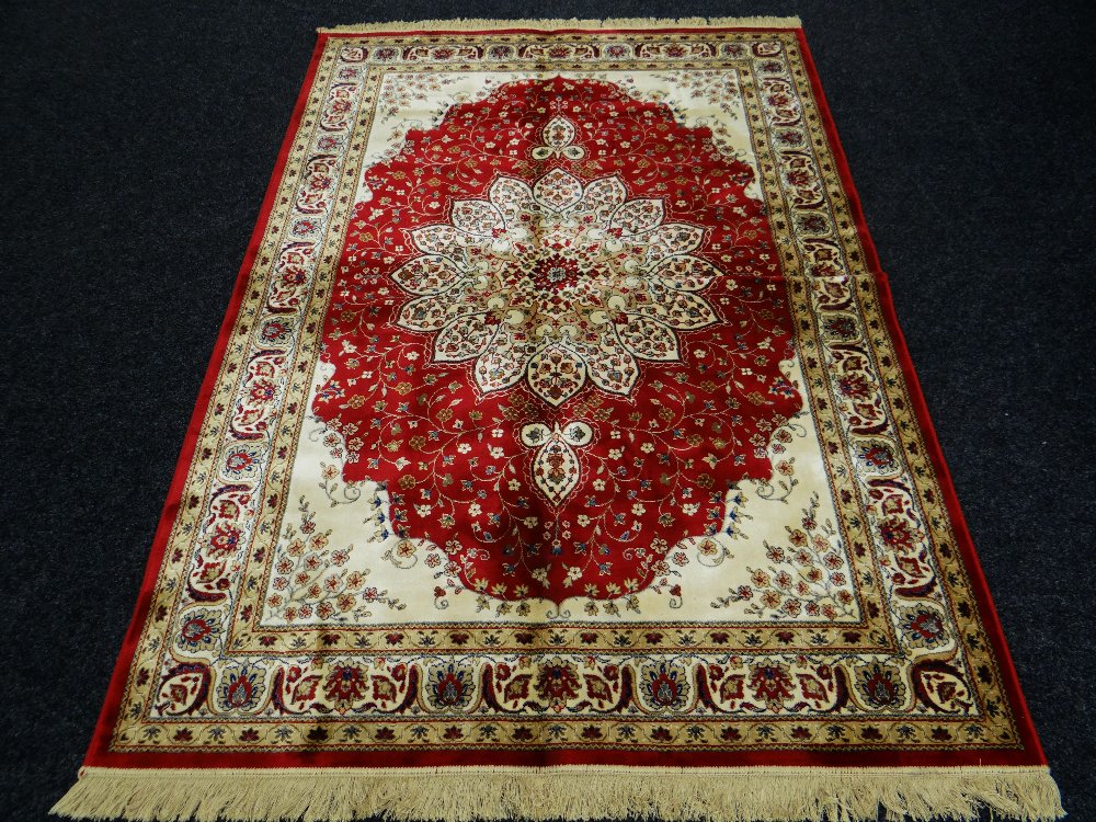 RED GROUND KASHMIR RUG traditional medallion design, 158 x 233cms