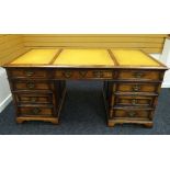 AN IMPRESSIVE TITCHMARSH & GOODWIN OF IPSWICH HANDCRAFTED OAK DESK with tri-section tooled tan-