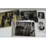 A COLLECTION OF APPROXIMATELY 40 UNSEEN BLACK & WHITE STILL PHOTOGRAPHS OF 1930S FILM SETS taken