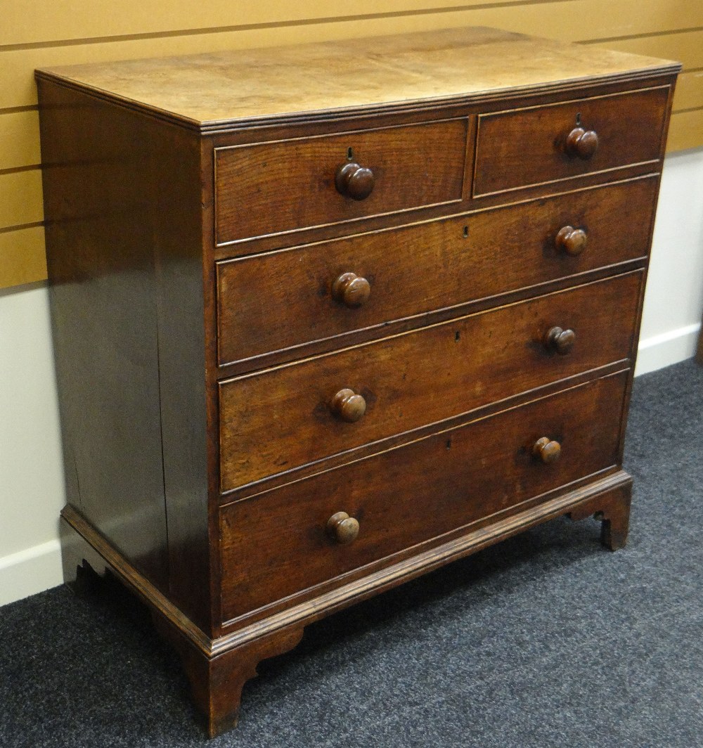 A NINETEENTH CENTURY OAK CHEST of three graduated and two short drawers with turned knobs and on - Image 2 of 2