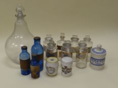 A QUANTITY OF ANTIQUE PHARMACEUTICAL GLASS & POTTERY VESSELS including a large pear-shaped glass