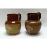 TWO DENBY ADVERTISING JUGS FOR CADBURY'S in two tone brown stoneware, one with the following to