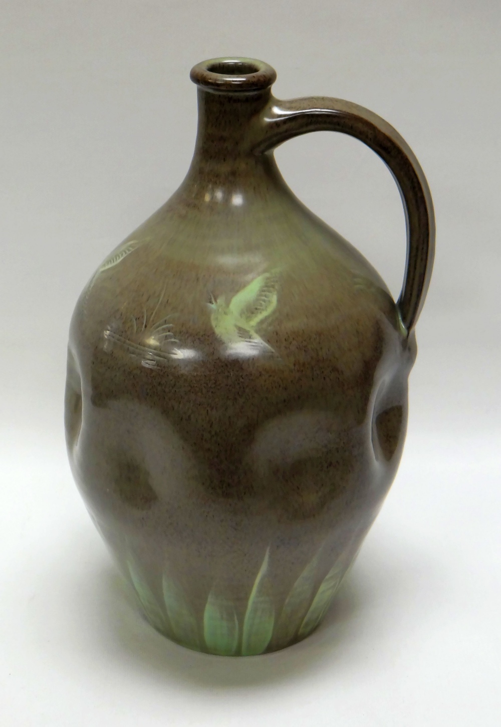 A WILLIAM FISHLEY HOLLAND STUDIO POTTERY FLASK with dimpled body, loop handle and in mottled grey