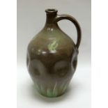 A WILLIAM FISHLEY HOLLAND STUDIO POTTERY FLASK with dimpled body, loop handle and in mottled grey