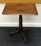 AN ELM TRIPOD TABLE with rounded rectangular top and turned column base, 56cms wide