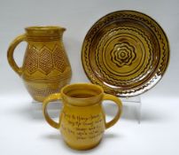 A WILLIAM FISHLEY HOLLAND STUDIO POTTERY GROUP OF THREE each in yellow glazed slipware, comprising