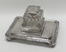 A FINE QUALITY GEORGE III SILVER & GLASS INKSTAND the base of rounded rectangular form with