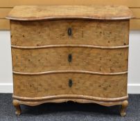 A NINETEENTH CENTURY CONTINENTAL THREE DRAWER SERPENTINE FRONTED COMMODE with parquetry top, front