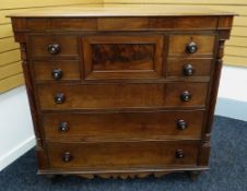 VICTORIAN OAK AND MAHOGANY SCOTTISH-STYLE CHEST OF DRAWERS with three graduated long drawers, a pair