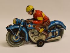 A TIPP & CO TINPLATE MOTORCYCLE WITH RIDER 'TCO-58', with internal clockwork motor, the motorbike in