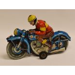 A TIPP & CO TINPLATE MOTORCYCLE WITH RIDER 'TCO-58', with internal clockwork motor, the motorbike in