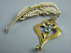 A NINE CARAT GOLD PENDANT heart shaped with two blue? stones, 2 grms, a leaf brooch encrusted with