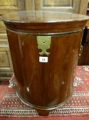 A 19th CENTURY CYLINDER MAHOGANY LIDDED COAL BIN, the 42 cms top with brass hinge and limiting