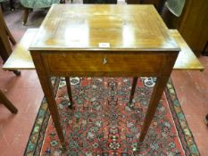 A REGENCY MAHOGANY SIDE TABLE with quarter veneered top having a central oval panel, crossbanded and