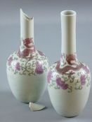 A PAIR OF 19th CENTURY CHINESE PORCELAIN BOTTLE VASES, the shoulders decorated with a crimson dragon