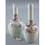 A PAIR OF 19th CENTURY CHINESE PORCELAIN BOTTLE VASES, the shoulders decorated with a crimson dragon