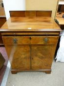 A GEORGE III GENTLEMAN'S SIDE CABINET, the moulded railback top over a pull-out brushing slide