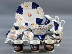 A COLLECTION OF GAUDY WELSH CHINA to include a part teaset, two small cabinet jugs, three small mugs