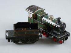 A BING CLOCKWORK LOCOMOTIVE with six wheel tender, gauge 0 in green, red and black livery, GBN marks