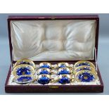 A CASED GLASS COFFEE SERVICE, twelve piece being six coffee cups and saucers, all in delicate blue