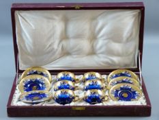 A CASED GLASS COFFEE SERVICE, twelve piece being six coffee cups and saucers, all in delicate blue