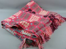 A WELSH WOOLLEN BLANKET, pink ground and with original label titled 'A Derw Product, Made in Wales'